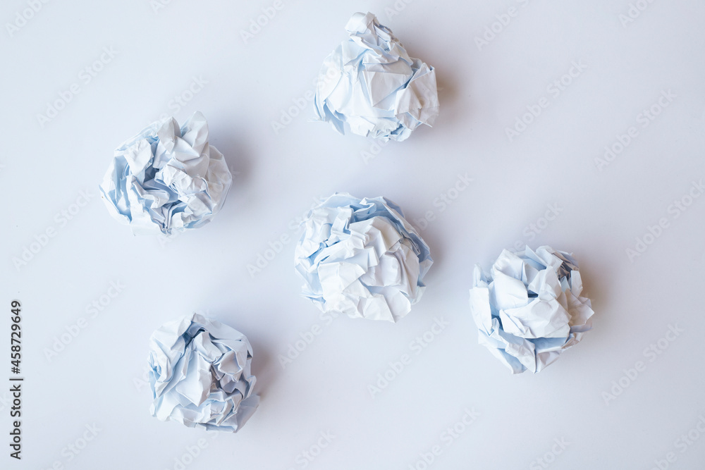 crumpled paper on white background with blank copyspace crumpled paper on white background with blank copyspace