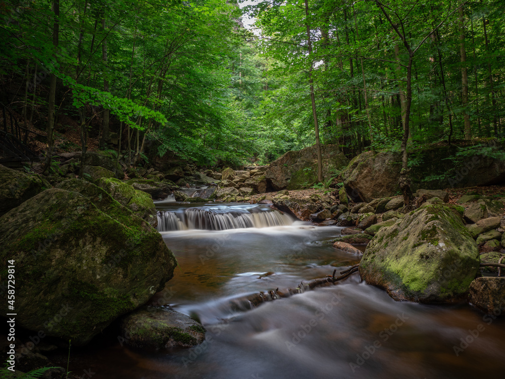 Waterfall on river Ilse in forest Harz, Germany