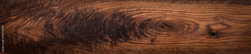 Walnut wood texture. Super long walnut planks texture background.Texture element Walnut wood texture. Super long walnut planks texture background.Texture element
