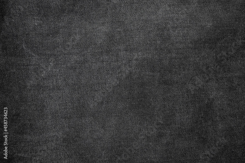 Background of black jeans denim texture