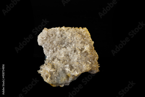 Macro mineral quartz stone on a black background