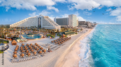 Cancun beach with resorts near blue ocean © jdross75