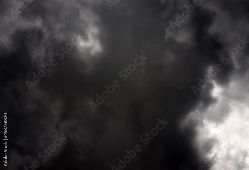 Nature sky background with gray and black clouds