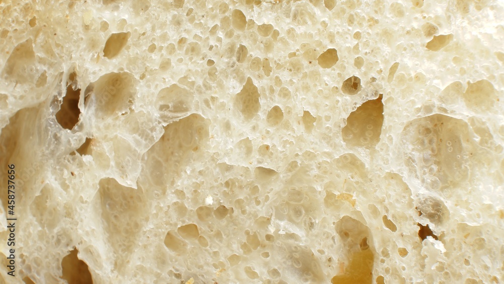 Close up of an airy porous bread slice Close up of an airy porous bread slice