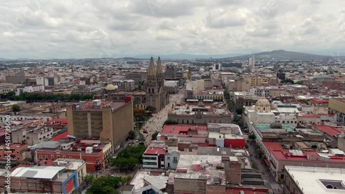 Big Buildings And Iconic Old Cathedral In Guadalajara Mexico - Aerial shot photo
