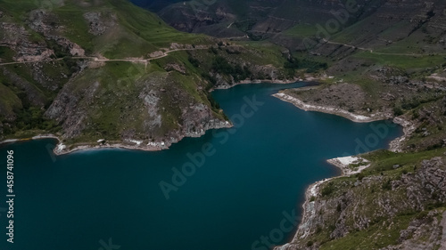 Fototapeta Naklejka Na Ścianę i Meble -  Emerald Water of Mountain Lake Gijgit in Kabardino-Balkaria, Russia. Aerial View