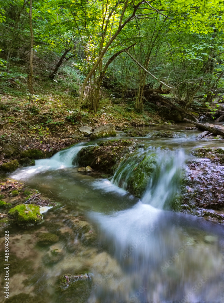 beautiful waterfall in the mountain forest beautiful waterfall in the mountain forest