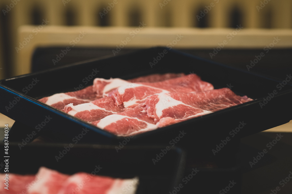 Raw beef for traditional Japanese food, Sukiyaki hot pot or Shabu Shabu Raw beef for traditional Japanese food, Sukiyaki hot pot or Shabu Shabu