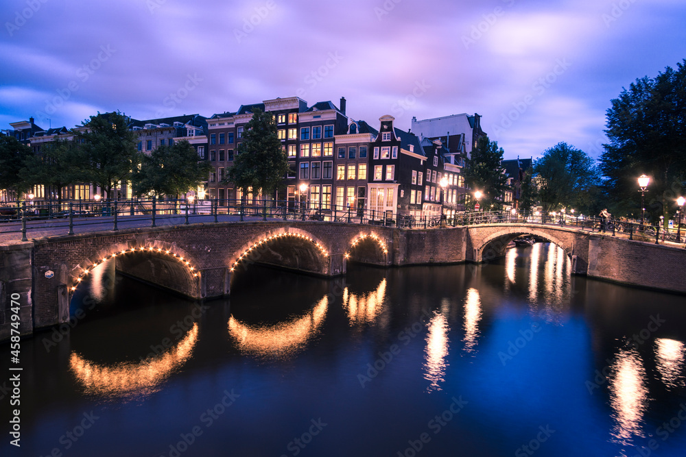 bridge over the river at night in Amsterdam