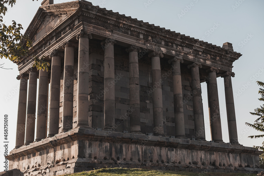 Obraz premium Ancient stone building with columns in Armenia. Historical heritage of Armenia. Old architecture. Sights of Europe.