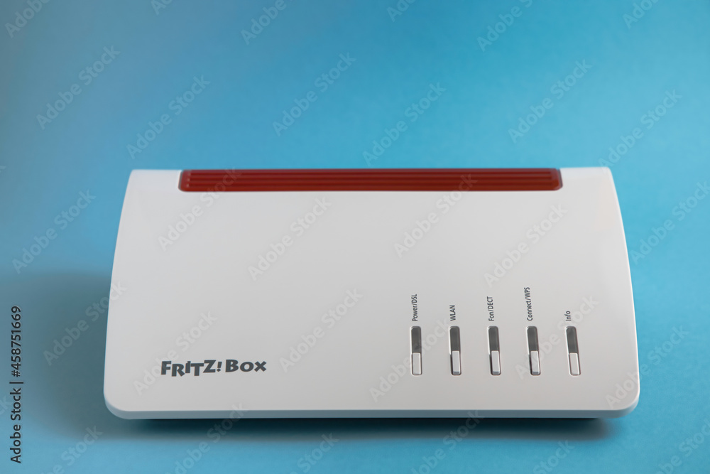OLDENBUR, GERMANY - Sep 19, 2021: isolated internet router fritz box made  by german company avm, fritzbox 7590 on a blue background Stock Photo |  Adobe Stock