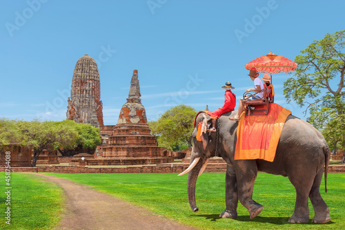 Tourists on an ride elephant tour of the ancient city