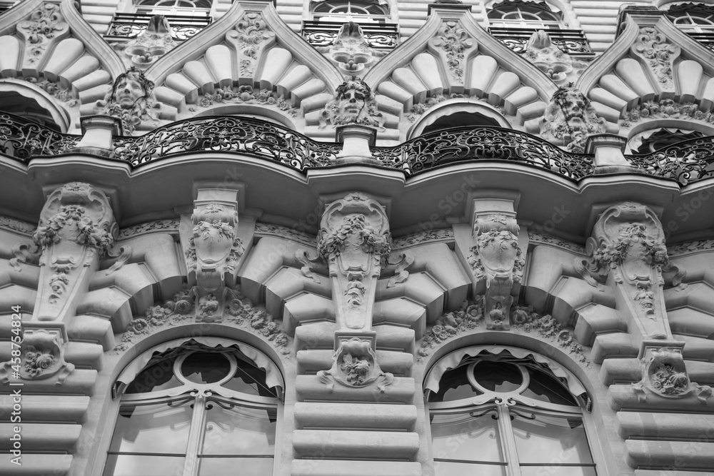Paris, France. Arched Windows With Balcony Of A Parisian Building ...