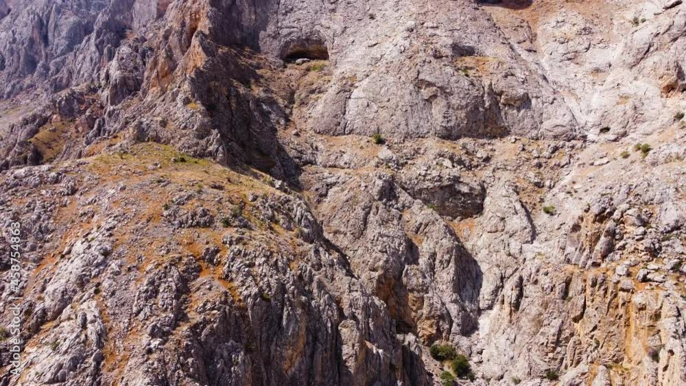 Huge Rocks, steep cliffs canyon. Dramatic geological wonder in Turkey. Beautiful background and unusual landscape, Birds eye view 4k aerial, Drone. Huge Rocks, steep cliffs canyon. Dramatic geological wonder in Turkey. Beautiful background and unusual landscape, Birds eye view 4k aerial, Drone.