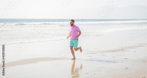barefoot sprinter. sport athlete run fast to win in sea daytime. morning workout activity. © Olena