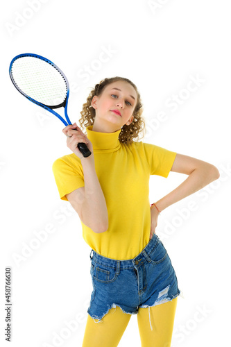 Portrait of happy girl posing with tennis racket