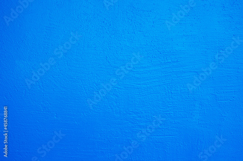 Blue painted wall background texture © photolink