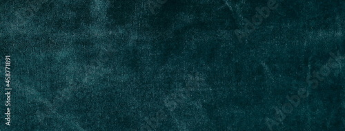 Velvet texture green color banner. Fabric background. Copy space. Template.