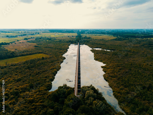 Aerial drone view of the beautiful historical Moerputten railroad bridge in the Netherlands photo