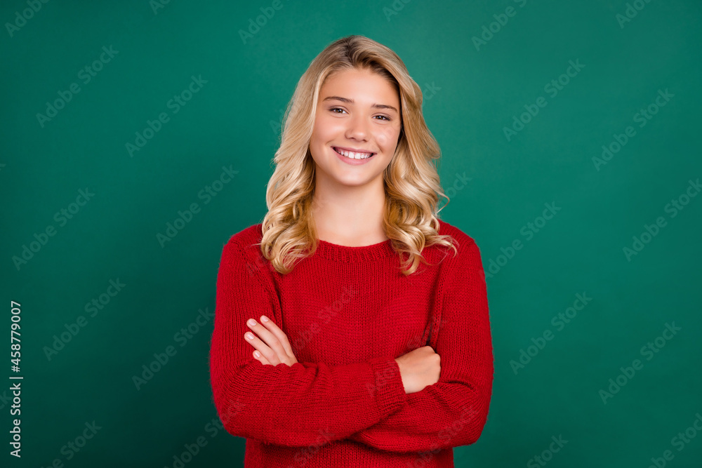 Photo of young attractive girl happy positive smile confident crossed hands isolated over green color background Photo of young attractive girl happy positive smile confident crossed hands isolated over green color background