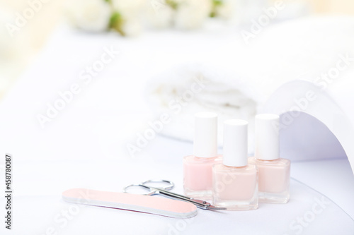 Different tools for manicure on white background