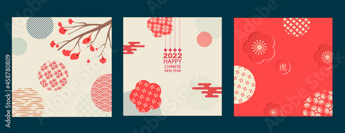 A set of cards for the celebration of the Chinese New Year of the Tiger with traditional patterns and symbols. Translation from Chinese - Happy New Year, symbol of the tiger
