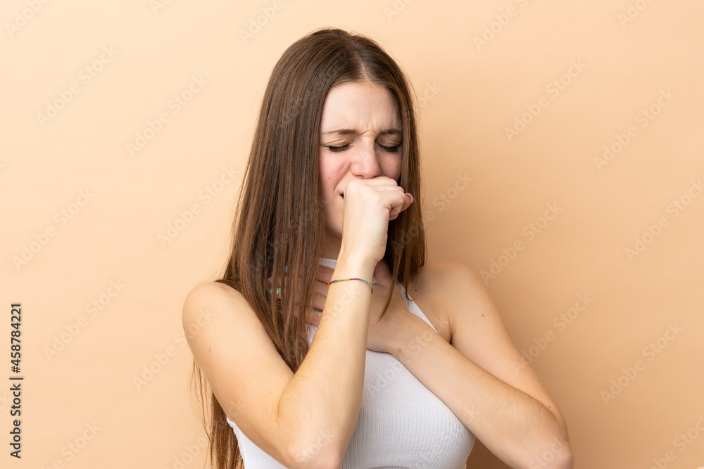 Young caucasian woman isolated on beige background coughing a lot Young caucasian woman isolated on beige background coughing a lot
