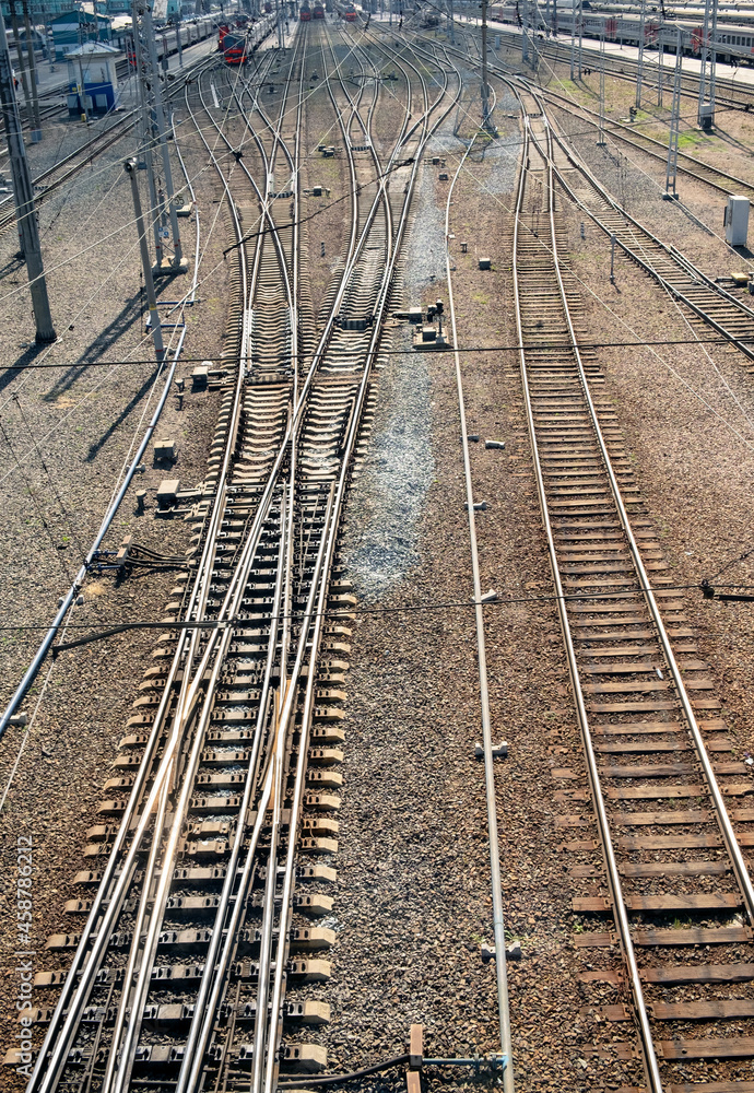 Railway rails at the station. Vertical photo