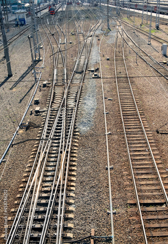 Railway rails at the station. Vertical photo