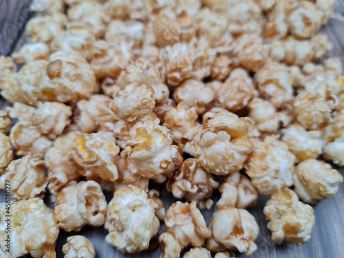 The Fresh hot natural popcorn close-up. Fresh caramel corn.