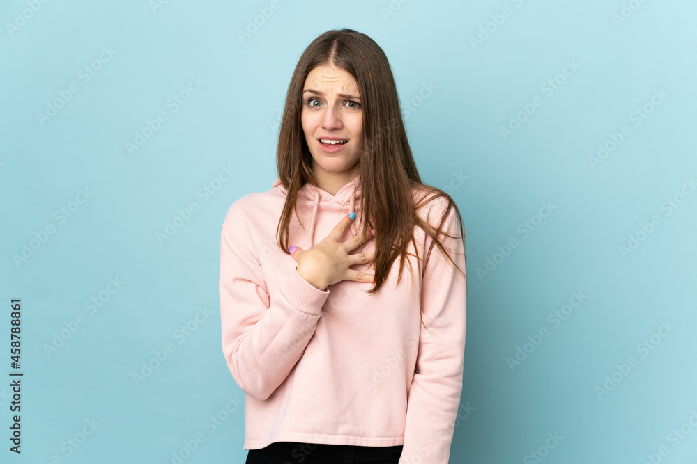Young caucasian woman isolated on blue background pointing to oneself Young caucasian woman isolated on blue background pointing to oneself