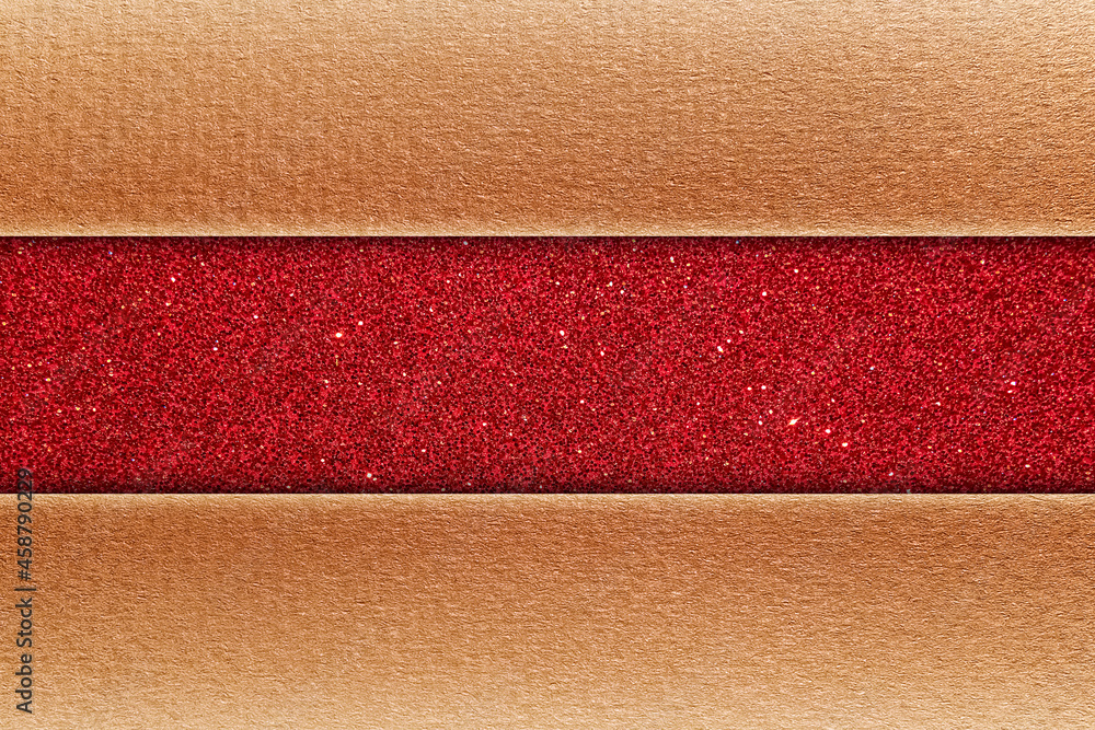 Fototapeta premium Cardboard texture with red glittering stripe