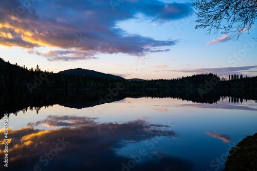 Evening and sunset at lake Ølja in Nordmarka in Norway