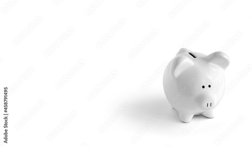 Piggy bank on white background to right side isolated with shadow