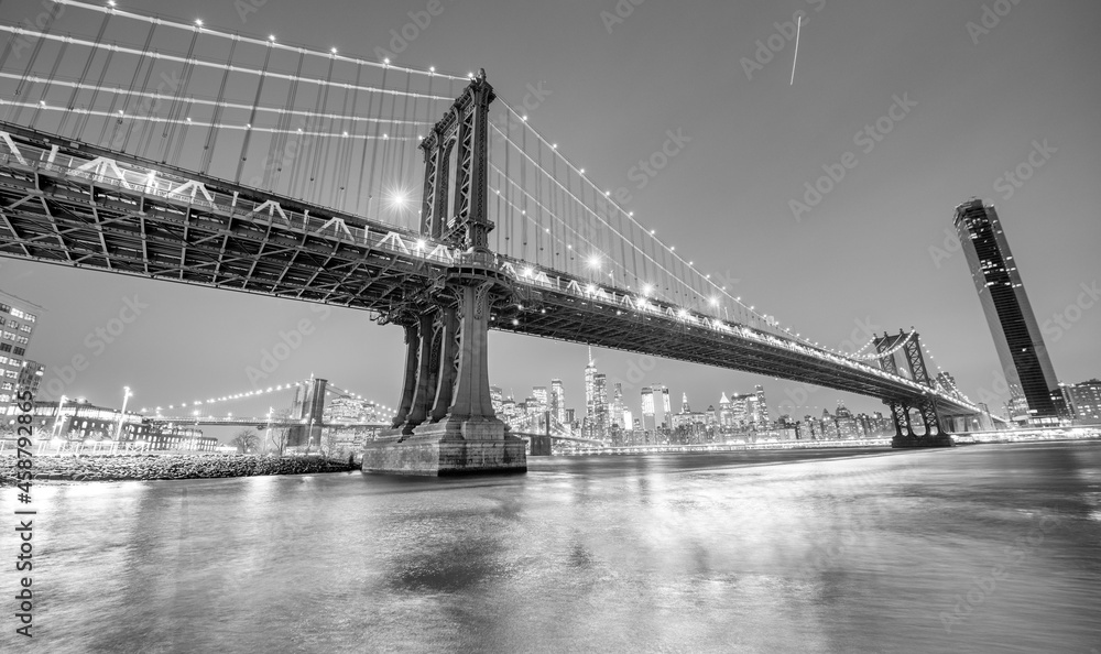 The Brooklyn and Manhattan Bridges at night from Broolyn Bridge Park, New York City in winter.