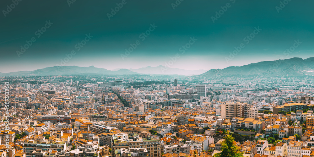 Urban panorama, aerial view, cityscape of Marseille, France. Sunny summer day with bright blue sky