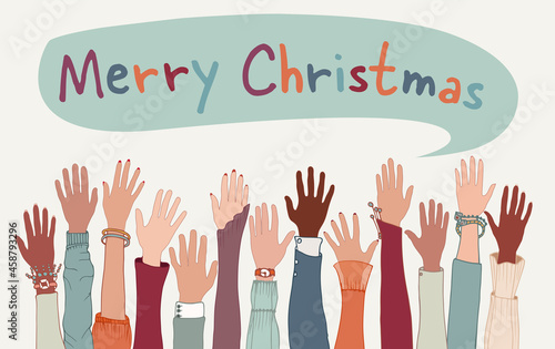 Raised arms and hands of co-workers or friends diverse multicultural people with above letters forming the text -Merry Christmas- Happy Holidays Christmas Greetings. Equality. Community