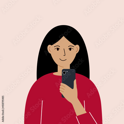 Joyful woman with mobile phone, front view. Taking pictures, reading, chatting. Smartphone and internet addiction.