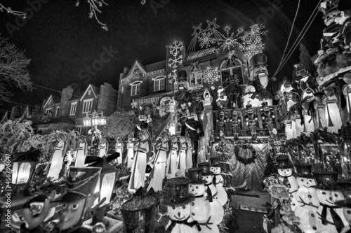 DIKER HEIGHTS, NY - DECEMBER 6th, 2018: Exterior view of famous district with colorful home Christmas decorations at night. photo