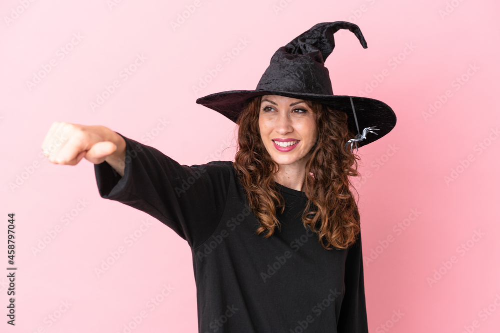 Young caucasian woman celebrating halloween isolated on pink background giving a thumbs up gesture Young caucasian woman celebrating halloween isolated on pink background giving a thumbs up gesture
