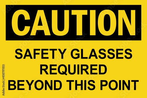Safety glasses required beyond this point caution sign. Black on yellow background. Safety products signs and symbols.