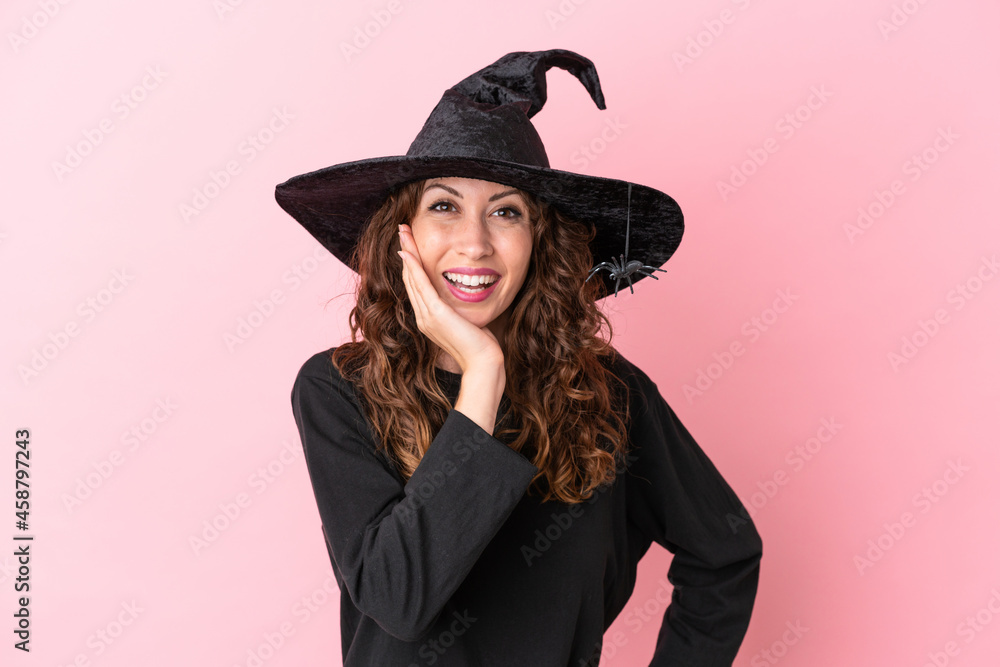 Young caucasian woman celebrating halloween isolated on pink background with surprise and shocked facial expression Young caucasian woman celebrating halloween isolated on pink background with surprise and shocked facial expression