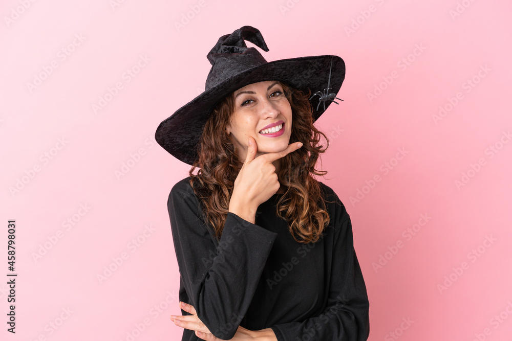 Young caucasian woman celebrating halloween isolated on pink background smiling Young caucasian woman celebrating halloween isolated on pink background smiling