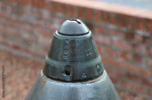 detail of a british first worldwar artillery shell percussion fuze. detonator with engraved lot and type number photo