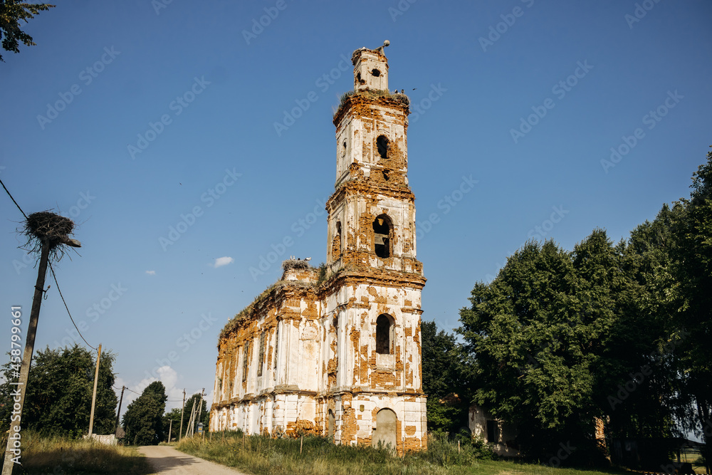 Old destroyed church. Ruins of the Church of St. Onuphrius. Storks nest on a ruined old church