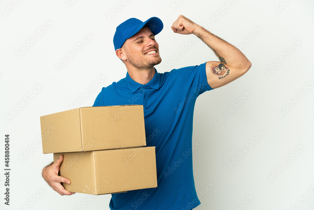 Delivery caucasian man isolated on white background celebrating a victory Delivery caucasian man isolated on white background celebrating a victory