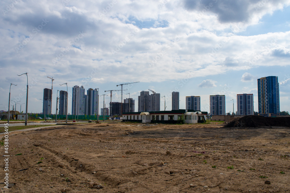 Construction of a new urban area and new buildings. New quarter. 20 September 2021, Minsk, Belarus Construction of a new urban area and new buildings. New quarter. 20 September 2021, Minsk, Belarus
