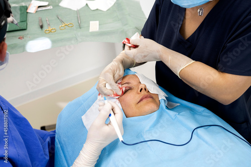 Plastic surgery operation, modifying the eye region in medical clinic photo