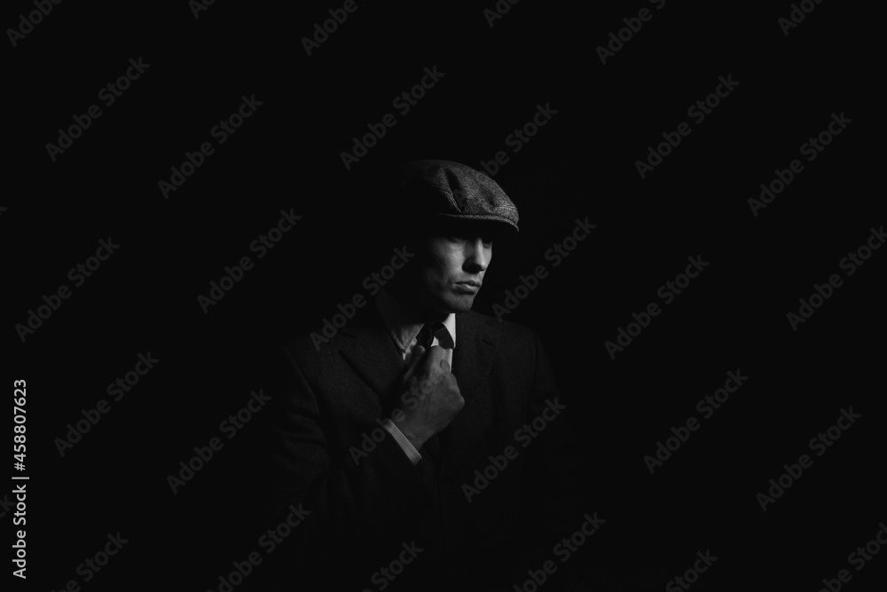 portrait of a man in the dark. black and white portrait portrait of a man in the dark. black and white portrait