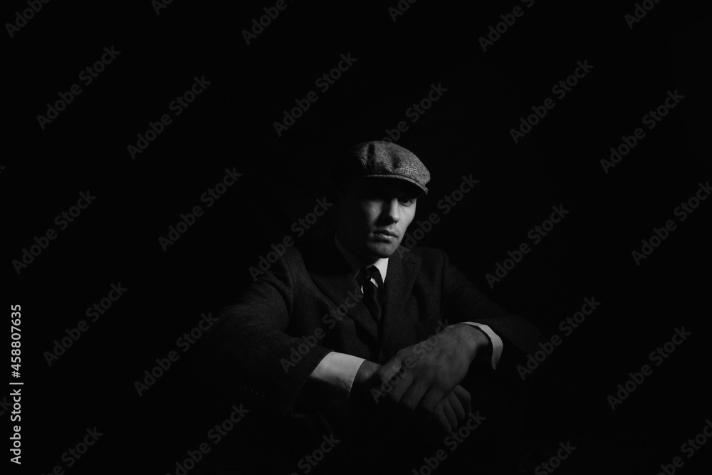 portrait of a man in the dark. black and white portrait